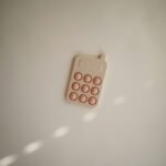 Mushie pop it žaislas - telefonas „Blush“